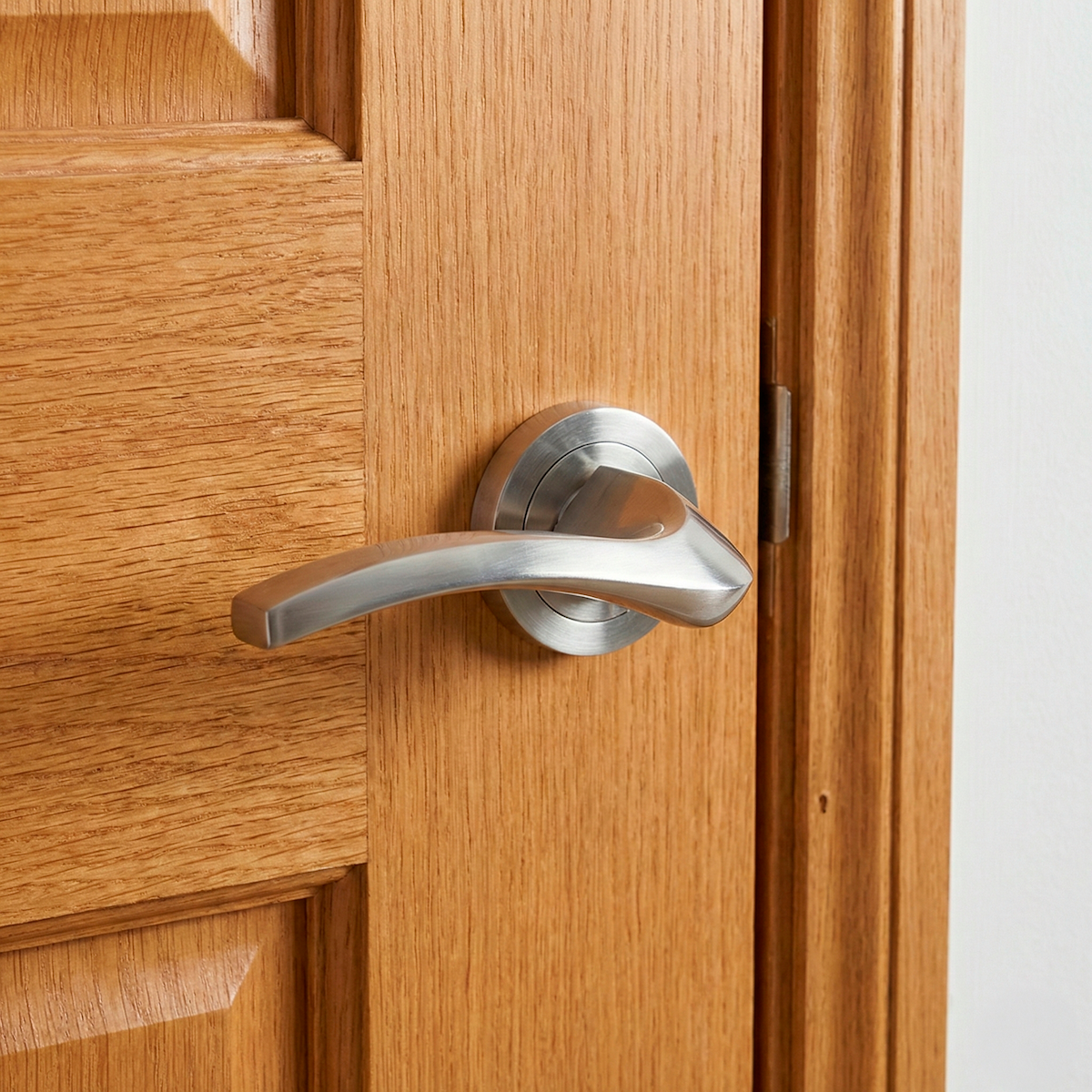 Manilla Tique para puerta con roseta redonda de aluminio