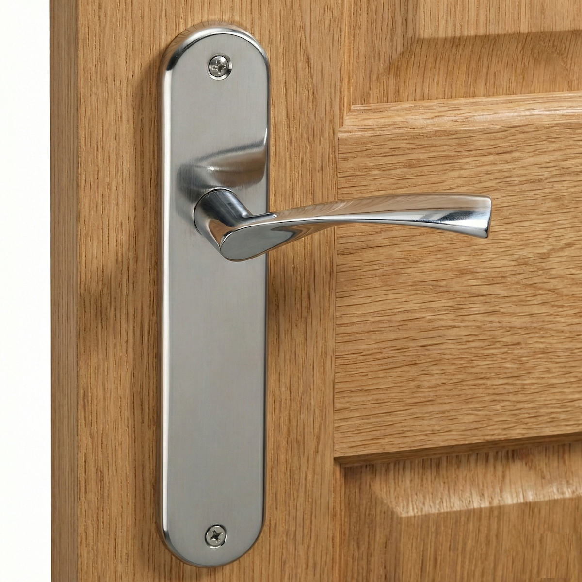 Manilla modelo '130' ola con placa ovalada de zamak para puertas en acabado níquel satinado